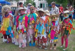 Pearl B. Larsen Masqueraders take part in Family Fun Day, or Fiesta En El Batey. Pearl B. Larsen Masqueraders take part in Family Fun Day, or Fiesta En El Batey.
